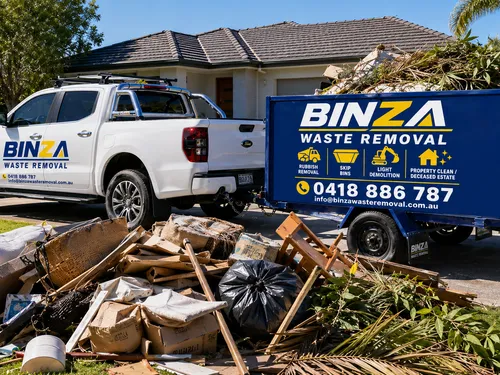 BINZA Waste Removal branded ute and trailer